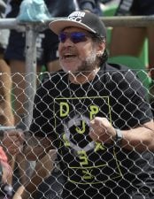 Argentina's former footballer Diego Maradona cheers during the 2017 Davis Cup World Group first round single tennis match between Argentina's tennis player Guido Pella and Italy's Fabio Fognini at Parque Sarmiento stadium in Buenos Aires on February 6, 20