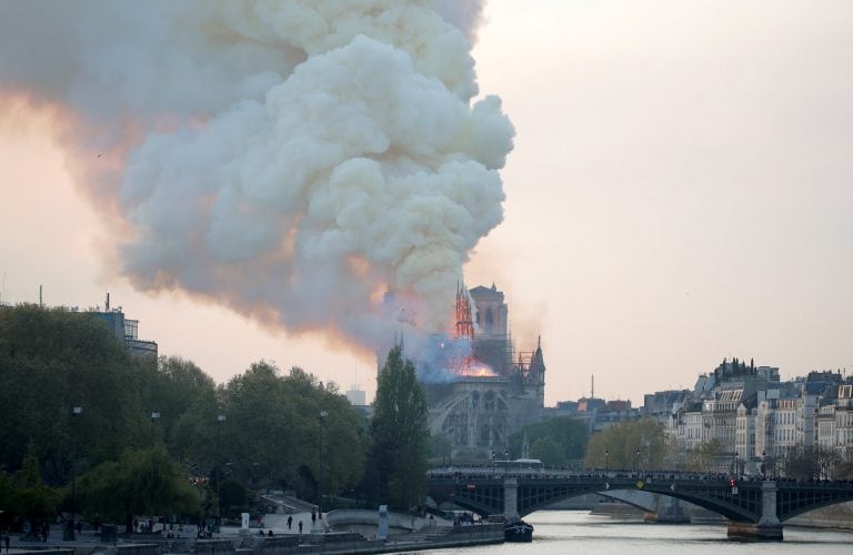 Smoke billows from Notre Dame Cathedral after a fire broke out, in Paris, France April 15, 2019. REUTERS/Charles Platiau