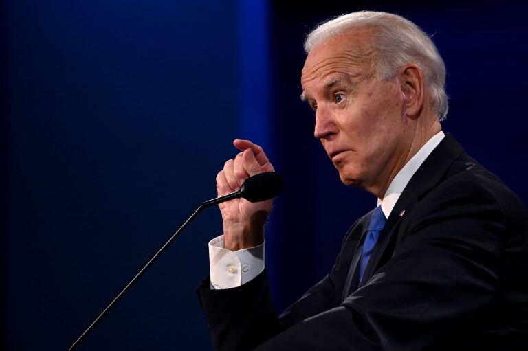 "La diferencia es que yo creo que la salud es un derecho, no un privilegio", dijo Biden. (Foto: JIM WATSON / AFP)