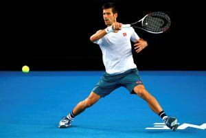 Serbia's Novak Djokovic hits a shot during a training session ahead of the Australian Open tennis tournament in Melbourne, Australia, January 13, 2017.       REUTERS/David Gray