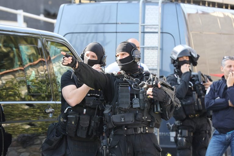 A member of the RAID (Search, Assistance, Intervention, Deterrence) French police unit gestures near the Tocqueville high school in the southern French town of Grasse, on March 16, 2017 following a shooting that left eight people injured.
At least eight p