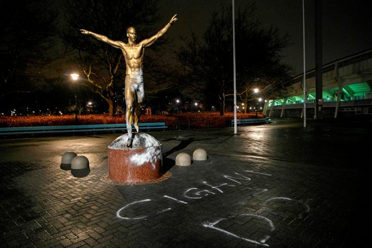 The fire-damaged statue of the Swedish football player Zlatan Ibrahimovic is pictured in Malmoe, November 28, 2019. - The statue was set alight after Ibrahimovic annonced the he have bought a share in the Swedish Stockholm based football team Hammarby. (Photo by Johan NILSSON / various sources / AFP) / Sweden OUT