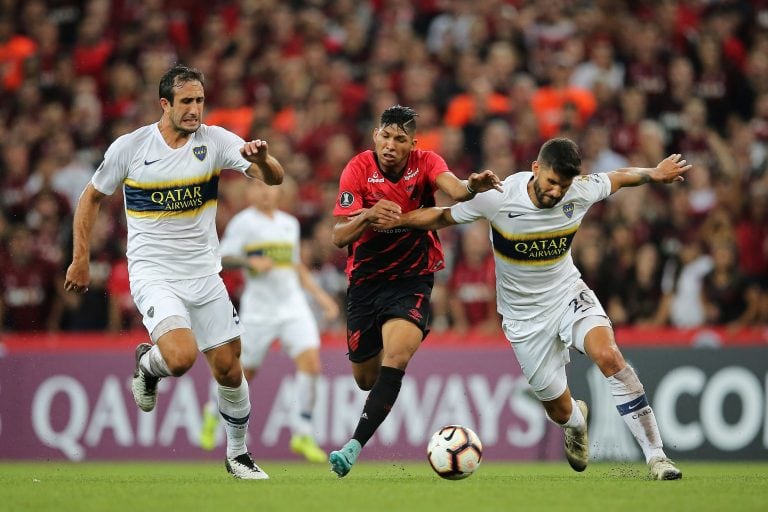 Carlos Izquierdoz y Lisandro Lopez. (AFP)