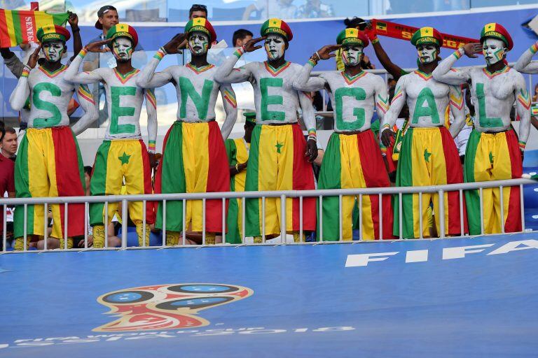 Hinchas pintados de Senegal.