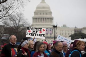 Demonstrators march past the US Capitol during the Women's March on Washington in Washington, DC, January 21, 2017.
Hundreds of thousands of protesters spearheaded by women's rights groups demonstrated across the US to send a defiant message to US Preside