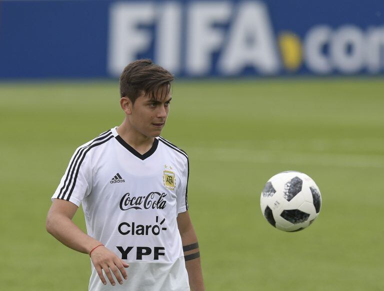 Argentina's forward Paulo Dybala takes part in a training session at the team's base camp in Bronnitsy, on June 13, 2018 ahead of the Russia 2018 World Cup football tournament. / AFP PHOTO / JUAN MABROMATA