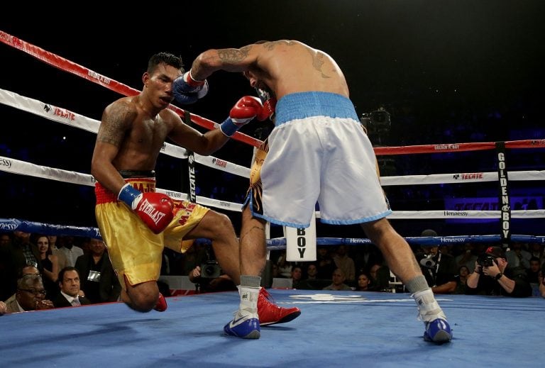 INGLEWOOD, CA - JANUARY 27: Tewa Kiram (L) of Thailand is knocked out by Lucas Matthysse of Argentina during their bout at The Forum on January 27, 2018 in Inglewood, California.   Jeff Gross/Getty Images/AFP
== FOR NEWSPAPERS, INTERNET, TELCOS & TELEVISION USE ONLY ==