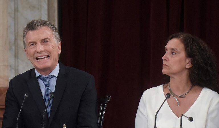 Argentina's President Mauricio Macri, left, gives the annual State of the Nation address at Congress next to Vice President Gabriela Michetti, right, in Buenos Aires, Argentina, Thursday, March 1, 2018. (AP Photo/Pablo Stefanec)