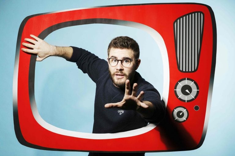 French web humorist Cyprien poses during a photo session in Paris on February 21, 2017.  / AFP PHOTO / JOEL SAGET