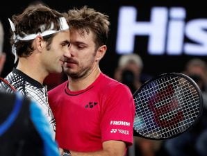 Switzerland's Roger Federer, left, is congratulated by compatriot Stan Wawrinka, after winning their semifinal at the Australian Open tennis championships in Melbourne, Australia, Thursday, Jan. 26, 2017. (AP Photo/Dita Alangkara)