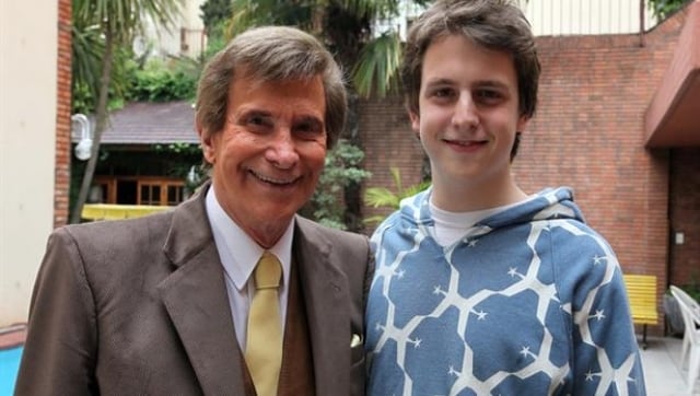 Christian de niño junto a su padre