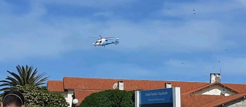 Alberto Fernández en uno de sus viajes en helicóptero.