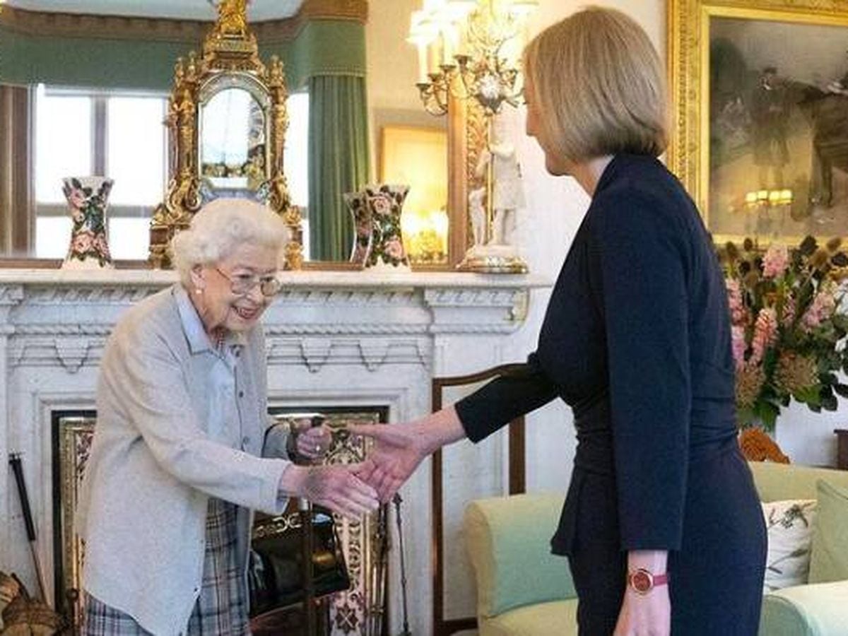 Liz Truss y la Reina Isabel II