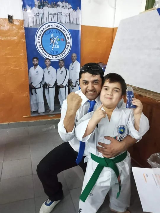 Fausto y su entrenador Carlos Velázquez.