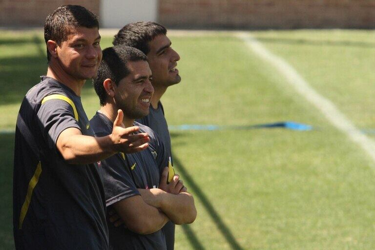 Battaglia y Riquelme mientras jugaban en Boca