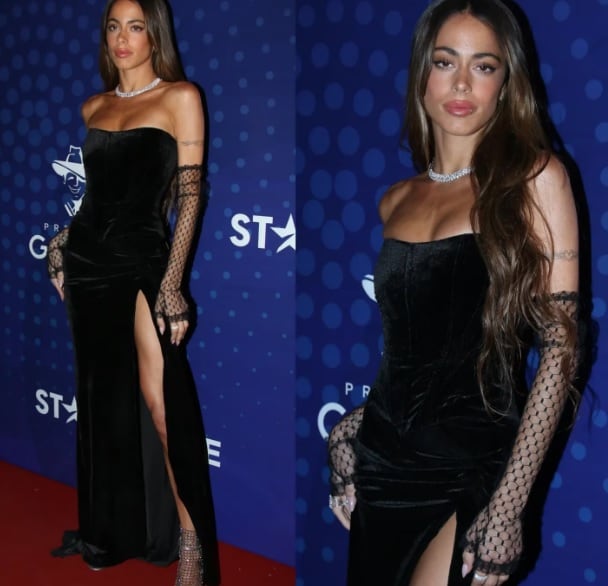 Tini y su total black en la alfombra.