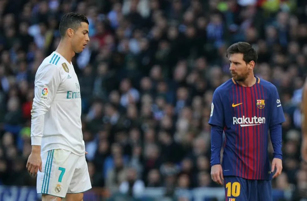 Leo Messi y Cristiano Ronaldo durante el clásico de España.