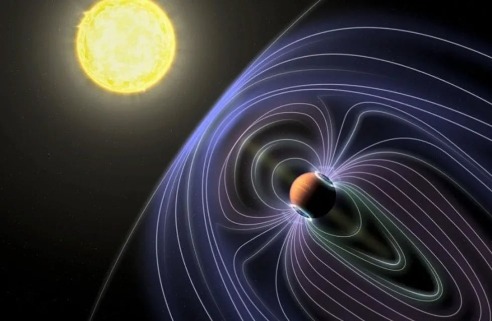 En esta representación artística del sistema Tau Boötes b, las líneas que representan el campo magnético invisible se muestran protegiendo al planeta Júpiter caliente del viento solar