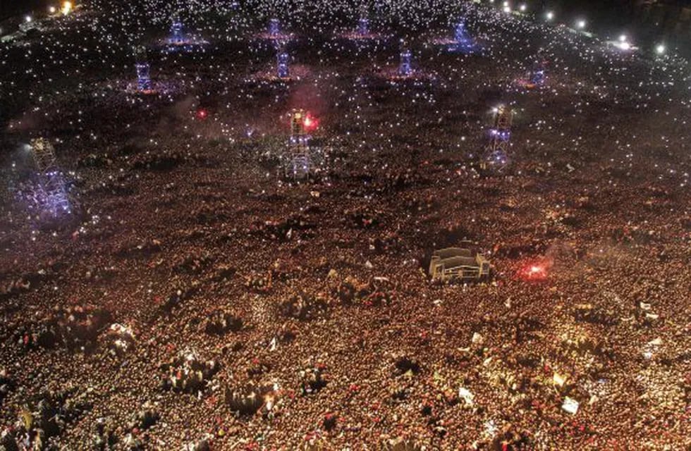 Aerial picture taken with a drone showing more than three hundred thousand fans during the concert of Argentine musician and song-writer Carlos Alberto Solari, better known as Indio, on March 12, 2017 in La Colmena, Olavarria, some 360 kilometres south-we