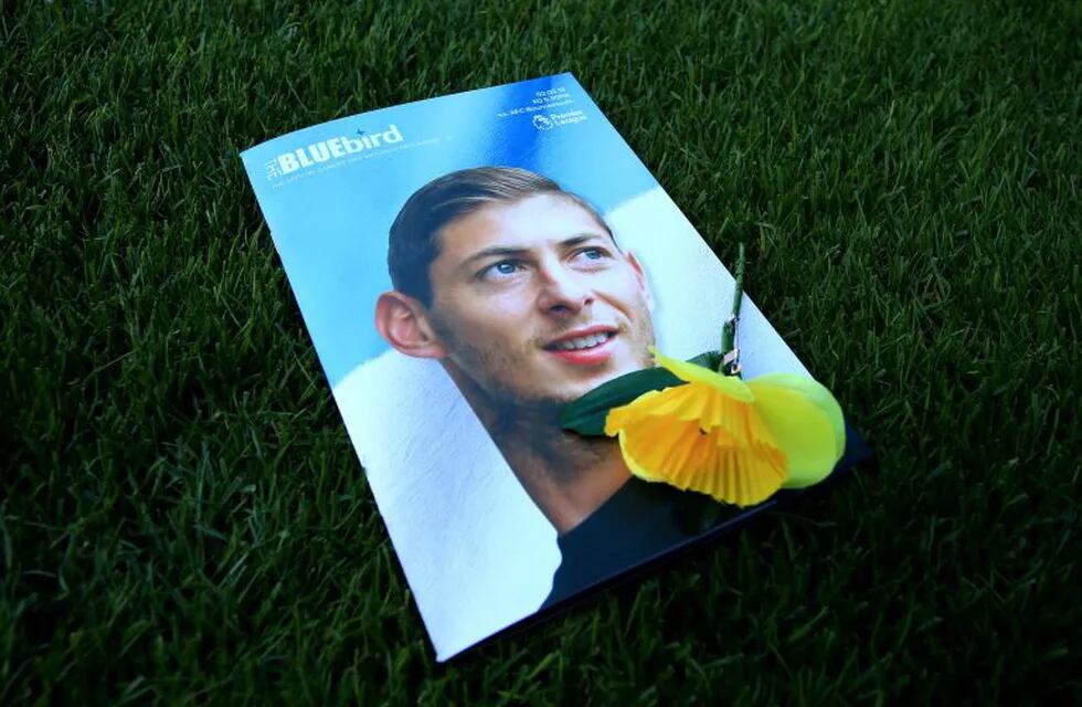 02 February 2019, England, Cardiff: A view of the match day programme with an image of Emiliano Sala on the cover, prior to the English Premier League soccer match between Cardiff City and AFC Bournemouth. The PA 46 Malibu plane with the 28-year-old Argentinian striker Emiliano Sala and pilot David Ibbotson on board disappeared from radar on the 28 of January. Photo: Mark Kerton/PA Wire/dpa