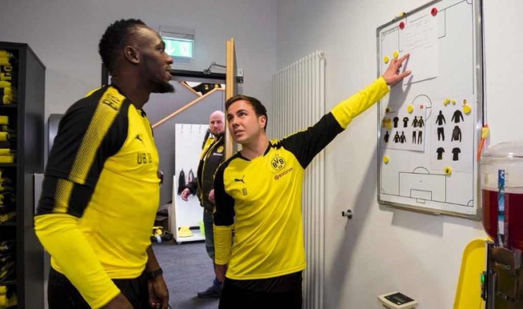 Bolt y Gotze. (Foto: Borussia Dortmund)