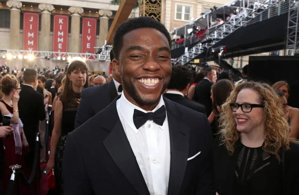 FILE - In this Feb. 28, 2016 file photo, Chadwick Boseman arrives at the Oscars in Los Angeles.  Boseman, who played Black icons Jackie Robinson and James Brown before finding fame as the regal Black Panther in the Marvel cinematic universe, has died of cancer. His representative says Boseman died Friday, Aug. 28, 2020 in Los Angeles after a four-year battle with colon cancer. He was 43.  (Photo by Matt Sayles/Invision/AP, File)
