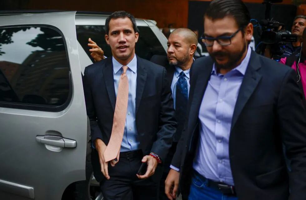 Opposition leader Juan Guaido arrives to the headquarters of the Democratic Action political party in Caracas, Venezuela, Wednesday, Jan. 15, 2020. (AP Photo/Matias Delacroix)