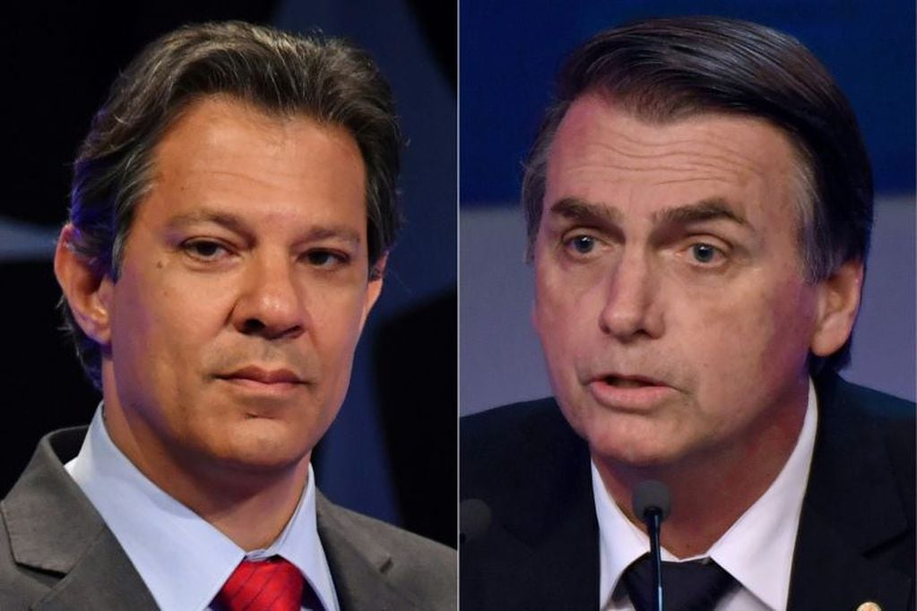 A la izquierda, Fernando Haddad. A la derecha, Jair Bolsonaro. (AFP)
