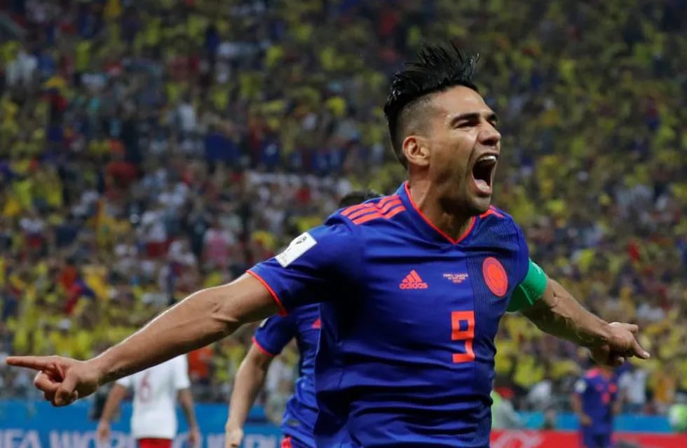 Kazan (Russian Federation), 24/06/2018.- Radamel Falcao of Colombia celebrates after scoring the 0-2 goal during the FIFA World Cup 2018 group H preliminary round soccer match between Poland and Colombia in Kazan, Russia, 24 June 2018.\r\n\r\n(RESTRICTIONS APPLY: Editorial Use Only, not used in association with any commercial entity - Images must not be used in any form of alert service or push service of any kind including via mobile alert services, downloads to mobile devices or MMS messaging - Images must appear as still images and must not emulate match action video footage - No alteration is made to, and no text or image is superimposed over, any published image which: (a) intentionally obscures or removes a sponsor identification image; or (b) adds or overlays the commercial identification of any third party which is not officially associated with the FIFA World Cup) (Mundial de Fútbol, Polonia, Rusia) EFE/EPA/ROBERT GHEMENT EDITORIAL USE ONLY