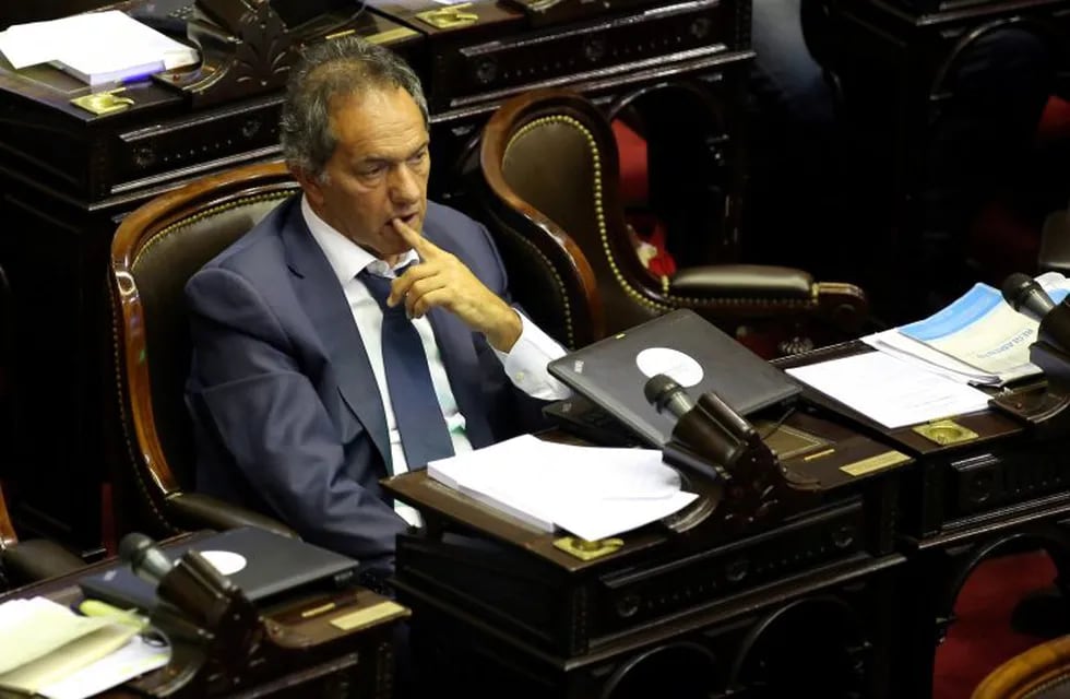 La Fiscalía de Estado no acompañó un pedido para impedirle a Scioli salir del país. (Foto: REUTERS/Agustin Marcarian)