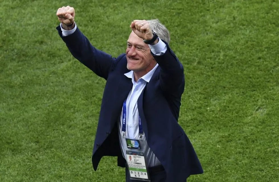 France's coach Didier Deschamps celebrates after winning the Russia 2018 World Cup round of 16 football match between France and Argentina at the Kazan Arena in Kazan on June 30, 2018. / AFP PHOTO / SAEED KHAN / RESTRICTED TO EDITORIAL USE - NO MOBILE PUSH ALERTS/DOWNLOADS