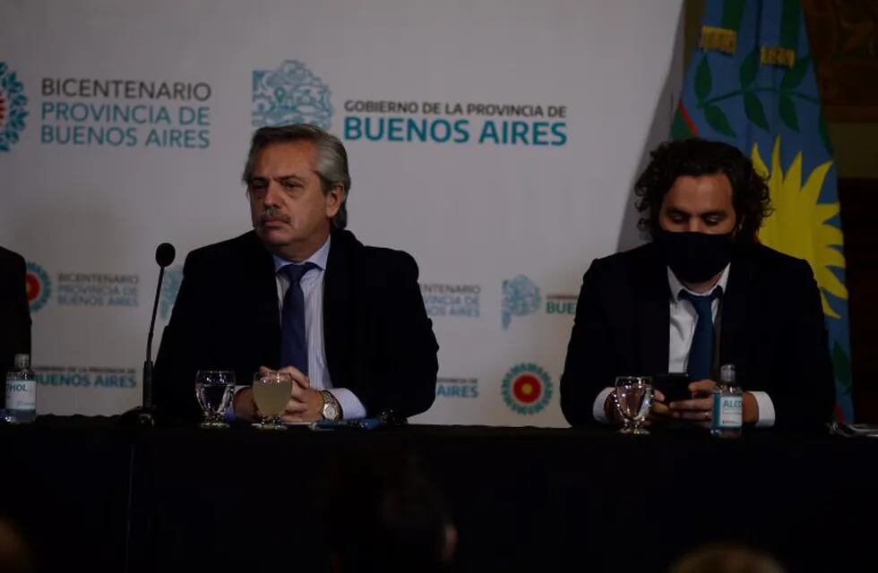 Argentine President Alberto Fernandez gestures as he offers a press conference to announce new measures regarding the lockdown to slow the spread of the novel coronavirus COVID-19, at Olivos Residence in Olivos, north of Buenos Aires, on May 23, 2020. - The pandemic has killed at least 338,128 people worldwide since it surfaced in China late last year, according to an AFP tally at 1100 GMT on Saturday based on official sources. (Photo by Alejandro PAGNI / AFP)